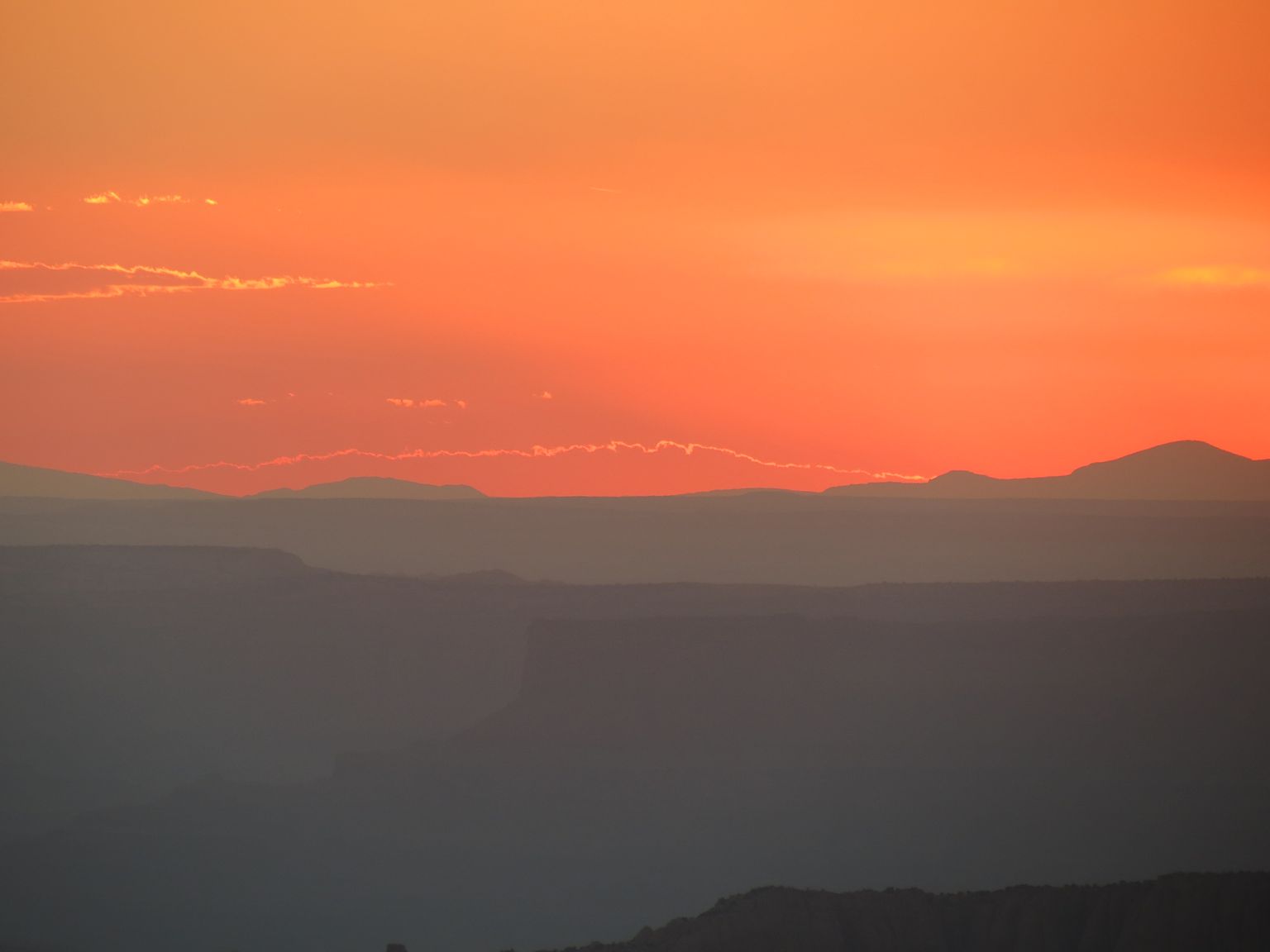 Sunset over Canyonlands, seen from the LaSal Mountains